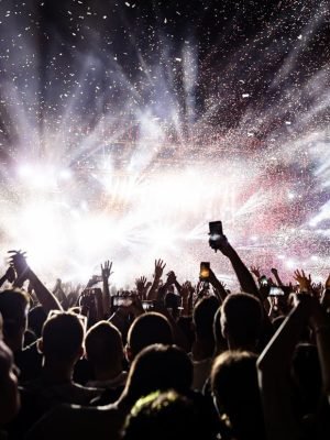 excited-audience-watching-confetti-fireworks-having-fun-music-festival-night-copy-space