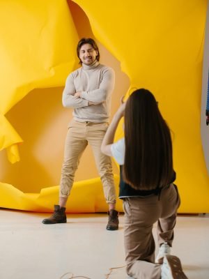 female-photographer-taking-pictures-of-professiona-2025-02-21-21-30-40-utc