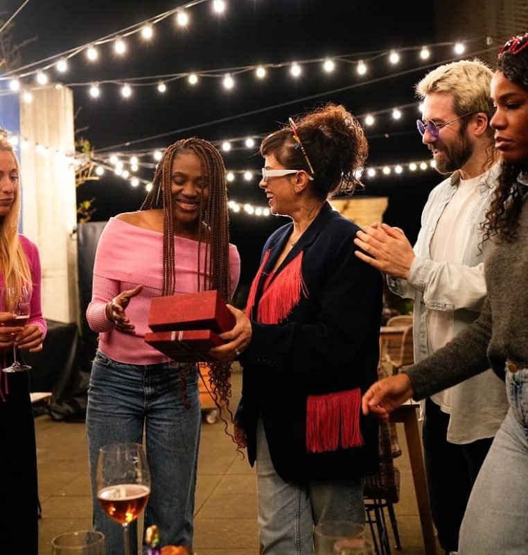 friends-giving-gifts-at-birthday-party-on-rooftop-2025-03-09-23-42-11-utc friends-giving-gifts-at-birthday-party-on-rooftop-2025-03-09-23-42-11-utc