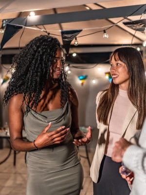 multi-ethnic-people-chatting-during-night-party-at-2024-12-10-03-23-59-utc